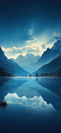 a lake with mountains in the background and water reflecting it's reflection on the surface