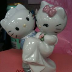 a hello kitty figurine sitting on top of a table