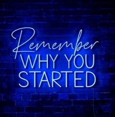 a neon sign that says, remember why you started