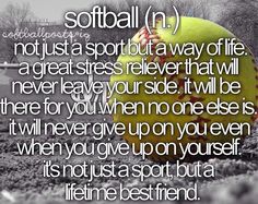 a softball sitting on top of a field with the words softball in it's center