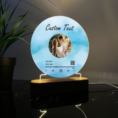 a personalized glass plate with an image of a bride and groom on the front