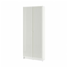 a tall white cabinet with two doors