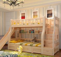 a child's bedroom with bunk beds, stairs and rugs on the floor