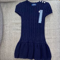 Adorable Cable Knit Sweater Dress From Polo Ralph Lauren! Features Scoopneck, 3 Button Placket Closure At Left Shoulder, Iconic Pony Embroidery On Left Chest, Short Sleeves And 100% Cotton. Nwt! Excellent Condition. Ralph Lauren Cable Knit Sweater, Pony Embroidery, Ralph Lauren Cable Knit, Cable Knit Sweater Dress, Ralph Lauren Dresses, Ralph Lauren Dress, Knit Sweater Dress, Cable Knit Sweater, Polo Dress