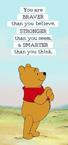 winnie the pooh is standing in front of a sign that says, you are brave than