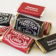 four different types of candy bars with labels on them