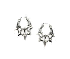 Add some gothic style to your wardrobe with these unique Chaos Earrings. Made in sterling silver, these earrings feature 5 spikes contrasted by a heavy textured crescent. Dimensions These earrings are 45mm long x 36mm wide and 5mm thick Each earring weighs approximately 6.5grams Edgy Silver Jewelry With Spikes, Silver Punk Jewelry With Spikes, Punk Style Silver Jewelry With Silver Studs, Edgy Silver Studs Jewelry, Alternative Silver Jewelry For Pierced Ears, Gothic Silver Earrings With Oxidized Finish, Silver Gothic Plug Earrings For Festival, Edgy Silver Sterling Silver Plug Earrings, Edgy Sterling Silver Plug Earrings