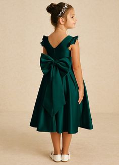 Francine boasts an elegant A-line silhouette in matte satin, featuring a graceful V-neck and charming cap sleeves. Perfectly poised for any special occasion, it combines sophistication with youthful charm. Peacock Flower Girl Dress, Satin Flower Girl Dresses, Green Flower Girl Dresses, Tea Length Flower Girl Dress, Peacock Flower, Blue Flower Girl, Flower Girl Dresses Blue, Satin Flower Girl Dress, Special Event Dresses