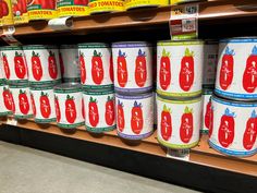 several cans of canned food on display in a store