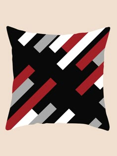 a black, red and white pillow with diagonal stripes on the front is featured against a beige background