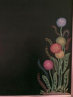 a painting of flowers on a black background