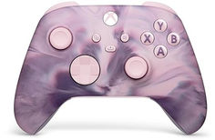 a close up of a controller on a white surface with pink and purple swirls