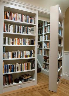 the bookshelves in this room are full of books