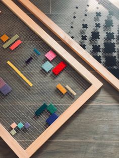 a wooden frame with some colored blocks on it