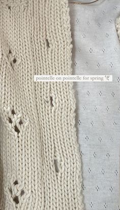 two sweaters with holes on them sitting next to each other