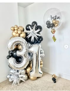 some balloons are in the shape of numbers and snowflakes on top of them