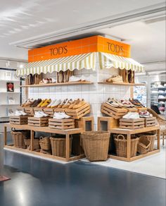 a store with lots of baskets and food on display