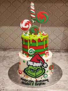 a christmas cake decorated with candy and candies