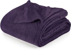 a purple blanket folded on top of each other