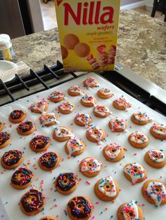 there are many doughnuts on the baking sheet