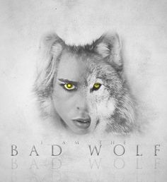 a woman's face with yellow eyes and the words bad wolf written on it