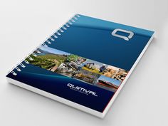 an open spiral notebook with pictures of different places in the world and text that reads quilvia