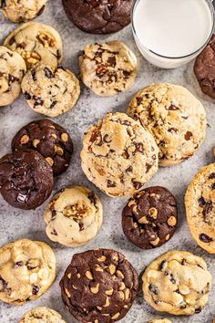 chocolate chip cookies and milk on a table