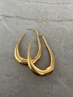 Oblong Earrings Trendy Brass Earrings, Trendy Brass Earrings For Pierced Ears, Trendy Formal Linear Earrings, Trendy Formal Teardrop Earrings For Pierced Ears, Trendy Teardrop Earrings For Formal Occasions, Trendy Everyday Earrings With Plating, Trendy Formal Teardrop Earrings, Chic Metal Drop Jewelry, Trendy Drop Earrings With Plating