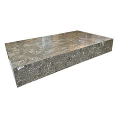 a large gray marble slab on a white background