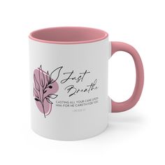 a pink and white coffee mug with the words, just breathe on it's side