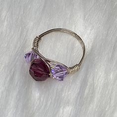 Purple Crystal Artisan Wire wrap Sterling Silver Ring Made with Swarovski crystals Size @7.5 Ring box & stand NOT included This is a new handmade ring This is the actual ring that you will receive It is made and ready to ship All sales final please see all pics. Diy Crystal Rings, Wire Wrap Rings, Wire Wrapped Crystal, Wrapped Crystal, Wire Wrapping Crystals, Diy Crystals, Handcrafted Artisan Jewelry, Purple Crystal, Wire Wrapped Rings