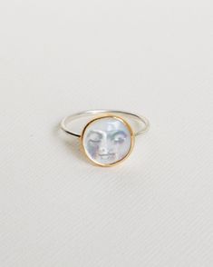 A hand carved mother of pearl moon face, hand set in a 14k gold filled setting. - Sterling silver band - 14k gold filled setting - Mother of pearl moon **Hand made & set in our studio Fantasy Earrings, Moon Face, Snake Jewelry, Moon Ring, Snake Earrings, Funky Jewelry, Jewelry Lookbook, Trendy Earrings, Cute Bracelets