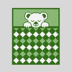 a green and white cross stitch pattern with a bear in the middle, on a gray background