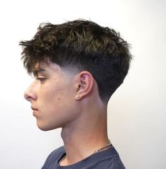 The textured fringe is a trendy style with short sides and a textured fringe on top. The fringe can be styled messy or neat, depending on the desired look. This style works well with most hair types and adds a youthful, energetic vibe.  Regular trims help maintain the shape and length of the fringe.
most popular trending hairstyles | Best Men's Hairstyles and Cuts | Haircut Trends for Men.
#Buzzcut #Shortcurlyquiff #Combover #Crewcut #Fauxhawk #Frenchcrop #Texturedpompadourfade #Mohawk Textured Fringe