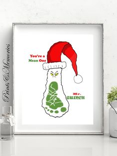 a christmas poster with an owl wearing a santa's hat and green boot on it