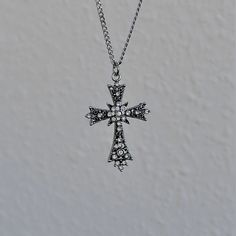 This silver gothic cross necklace boasts a vintage celtic pendant design, making it the perfect minimalist religious jewelry gift idea for your Catholic friend who appreciates grunge-inspired accessories. 𝐃𝐄𝐓𝐀𝐈𝐋𝐒:  ⭐️ Necklace lengths available 14" 16" 18" 20" ⭐️ Cross pendant size is 1 1/2" ⭐️ The silver cross charm is silver plated over alloy. The chain necklace is up on stainless steel, safe for sensitive skin ⭐️ The best statement piece, The Enlightend cross necklace  ⭐️ ALL jewelry i Gothic Cross Pendant Clavicle Chain Necklace, Gothic Clavicle Chain Necklace With Cross Pendant, Silver Cross Necklace With Clavicle Chain, Gothic Cross Necklace With Clavicle Chain, Gothic Cross Pendant Jewelry Gift, Gothic Cross Jewelry As Gift, Gothic Cross Jewelry Gift, Gothic Cross Jewelry For Gifts, Gothic Cross Clavicle Chain Jewelry