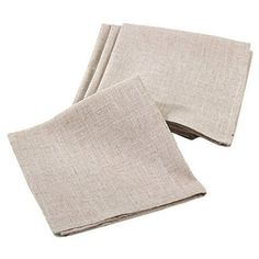 three linen napkins sitting on top of each other