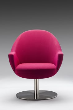 a bright pink chair sitting on top of a metal base in front of a gray background