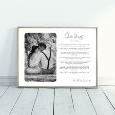 a photo frame with an image of a couple kissing