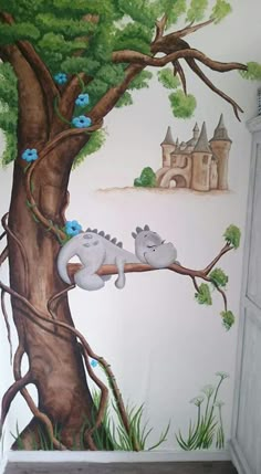 this is a wall mural in a child's room with two elephants on the tree