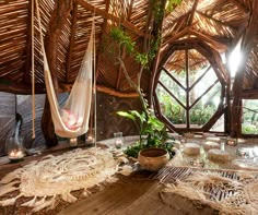 a hammock hanging from the ceiling in a room