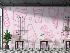 an ice cream shop with pink and white wallpaper