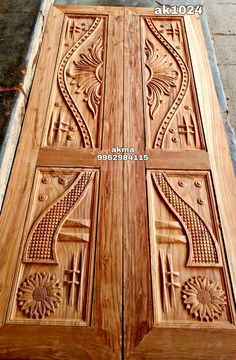 an intricately carved wooden door is shown