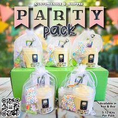 the party pack includes four small containers with candy in them and two large bags on top