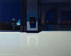 a room with a view of the city at night