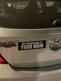 a car with a sticker on it that says, my other ride is your mom