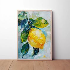 an abstract painting of a lemon on a white wall above a wooden table with a wood floor