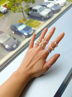 Cute beaded flower rings that will brighten up all your outfits and add a touch color to all styles! Made with Japanese Toho Beads, size 2mm and stretchy string so it'll be adjustable. Sizing is according to the ring finger.  *Please note that to preserve the rings for a long time, please keep it away from water and sunlight for the colors will fade away with time.* Beaded Flower Rings, Flower Rings, Toho Beads, Strawberry Milk, Flower Bracelet, Color Ring, Ring Finger, Free Items, Flower Ring