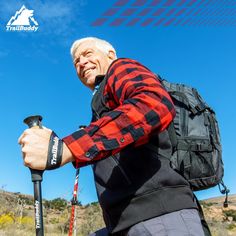 a man with a backpack and ski poles on the cover of an advertiser's brochure