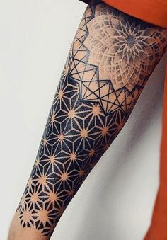 a person with a tattoo on their arm